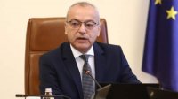 Премьер-министр: &quot;Банкротство государства&quot; - заголовок в СМИ